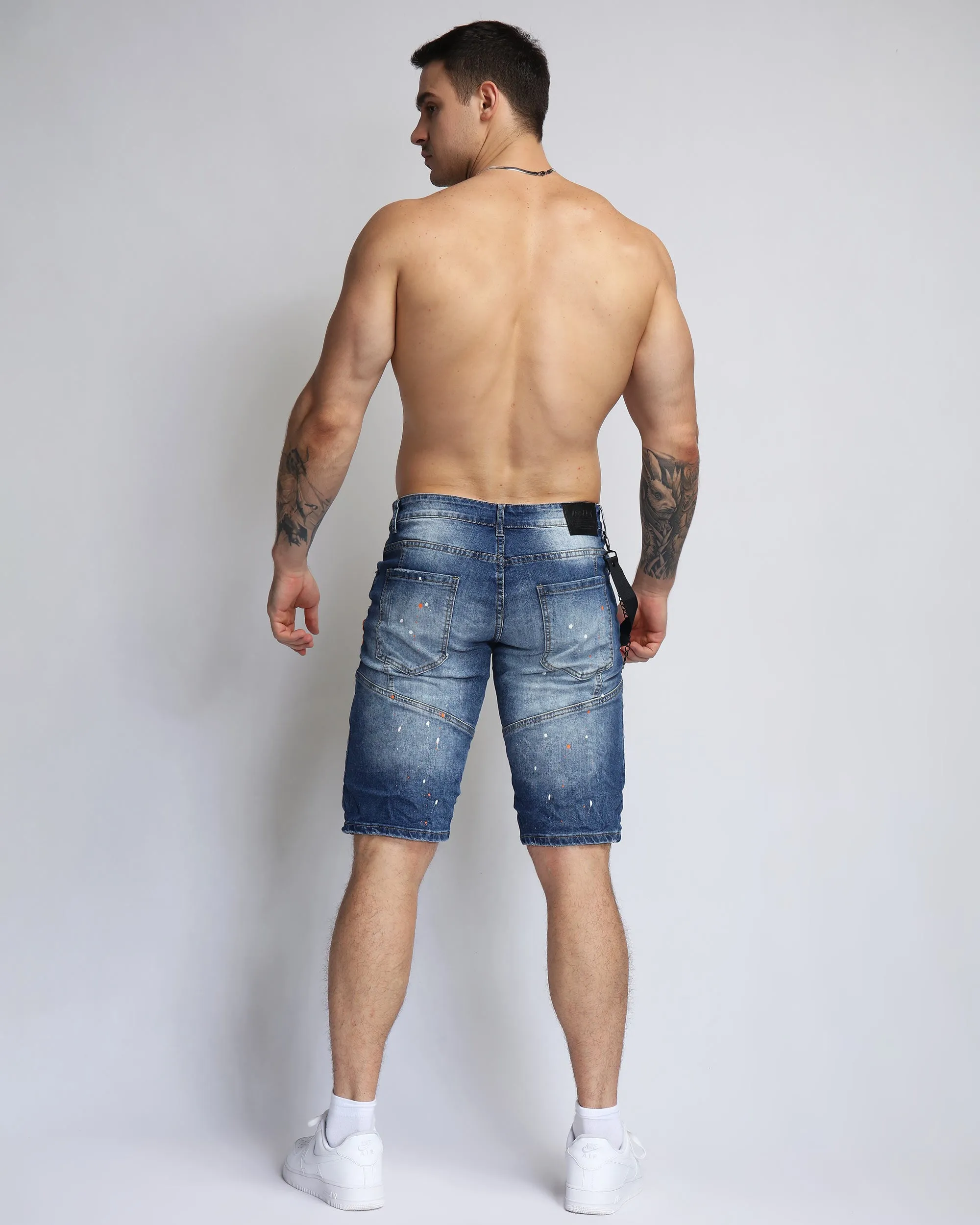Ripped Blue Denim Shorts with Personality Badge in Medium Wash